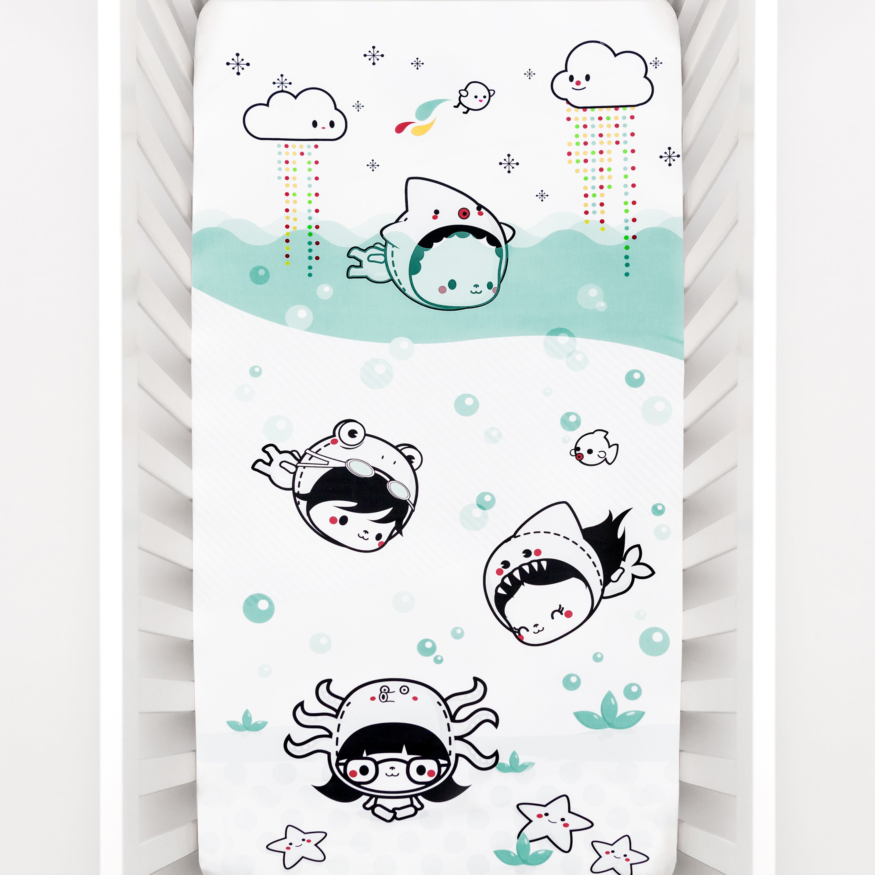 Fitted baby crib sheet by Rookie Humans, Dive In. Illustrated by Elisa Sassi. Designed for the modern nursery, packaged to make a unique baby shower gift. Underwater theme, under the sea nursery theme, under the ocean nursery theme, nautical nursery theme.