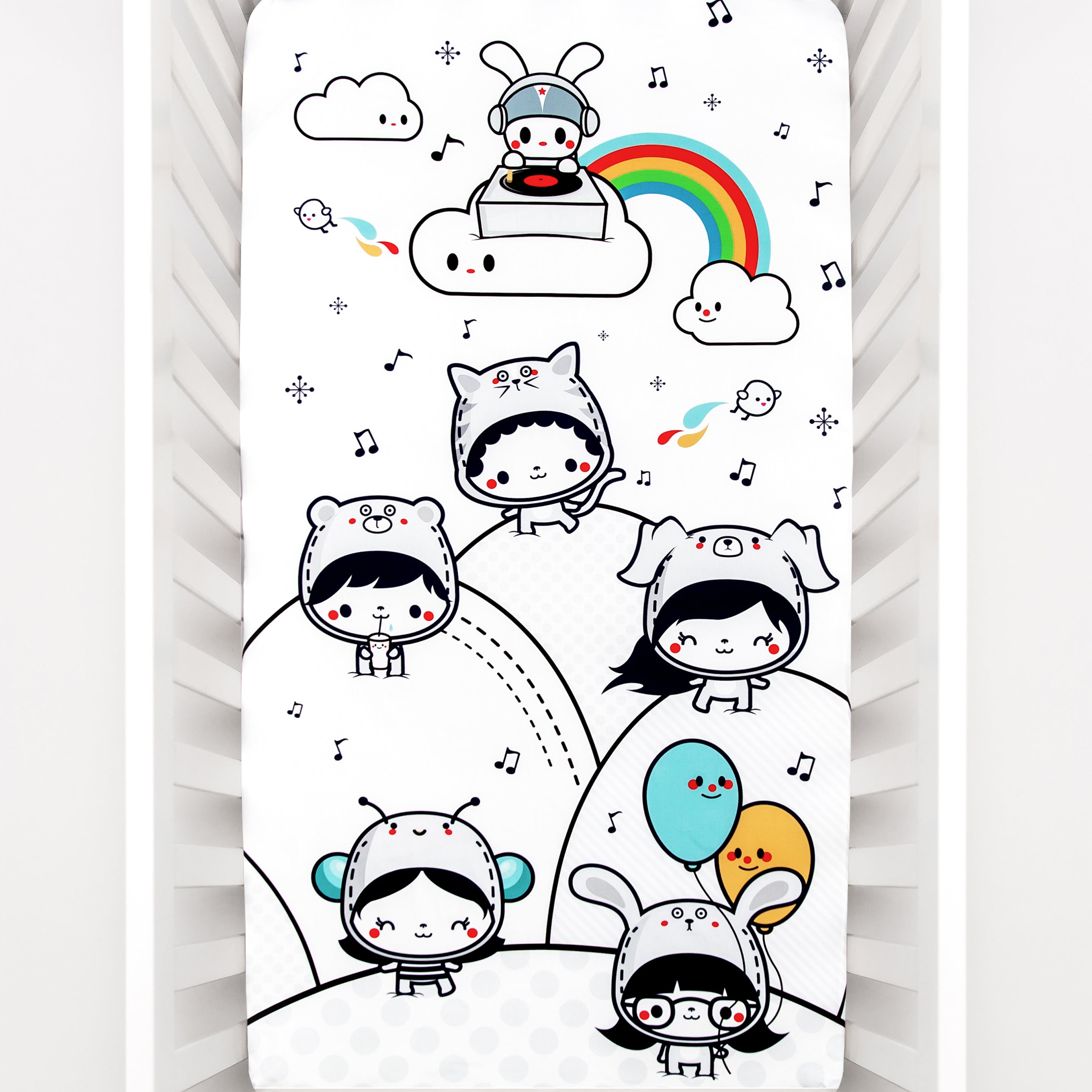 Fitted baby crib sheet by Rookie Humans, Party In My Crib, rainbow baby crib sheet. Illustrated by Elisa Sassi. Designed for the modern nursery, packaged to make a unique baby shower gift. Party DJ theme, balloons, music nursery theme, kawaii illustration.