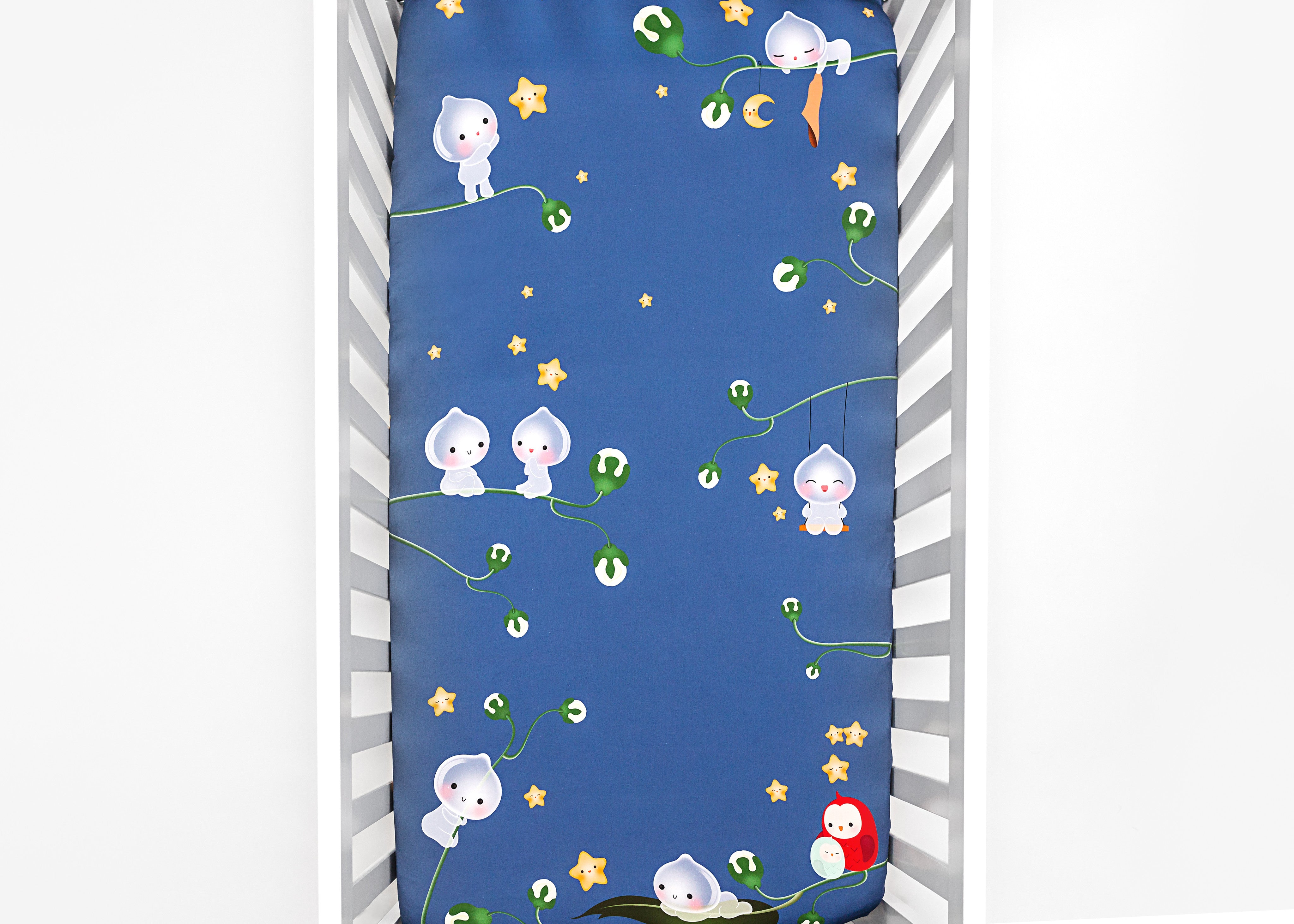 Fitted baby crib sheet by Rookie Humans, Magic Forest. Illustrated by Silvia Portella. Designed for the modern nursery, navy crib sheet.