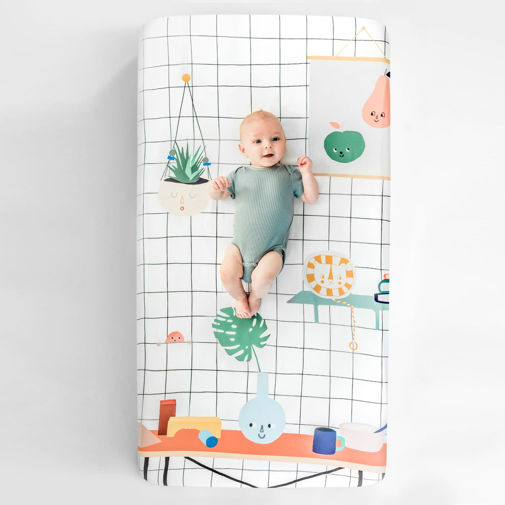 Baby's Room crib sheet by Rookie Humans. Modern crib sheet design has a hanging planter, painting, and toys.