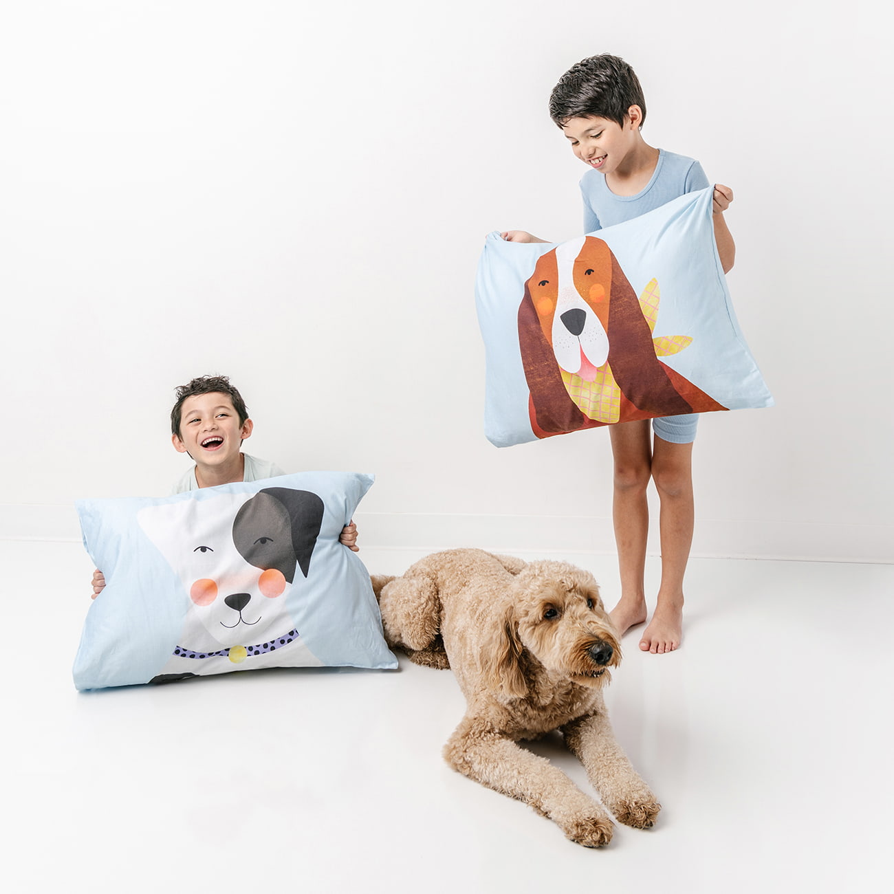 dog themed bedding for children, featuring different breeds including goldendoodle, dalmatian, golden retriever, beagle, husky, poodle and more