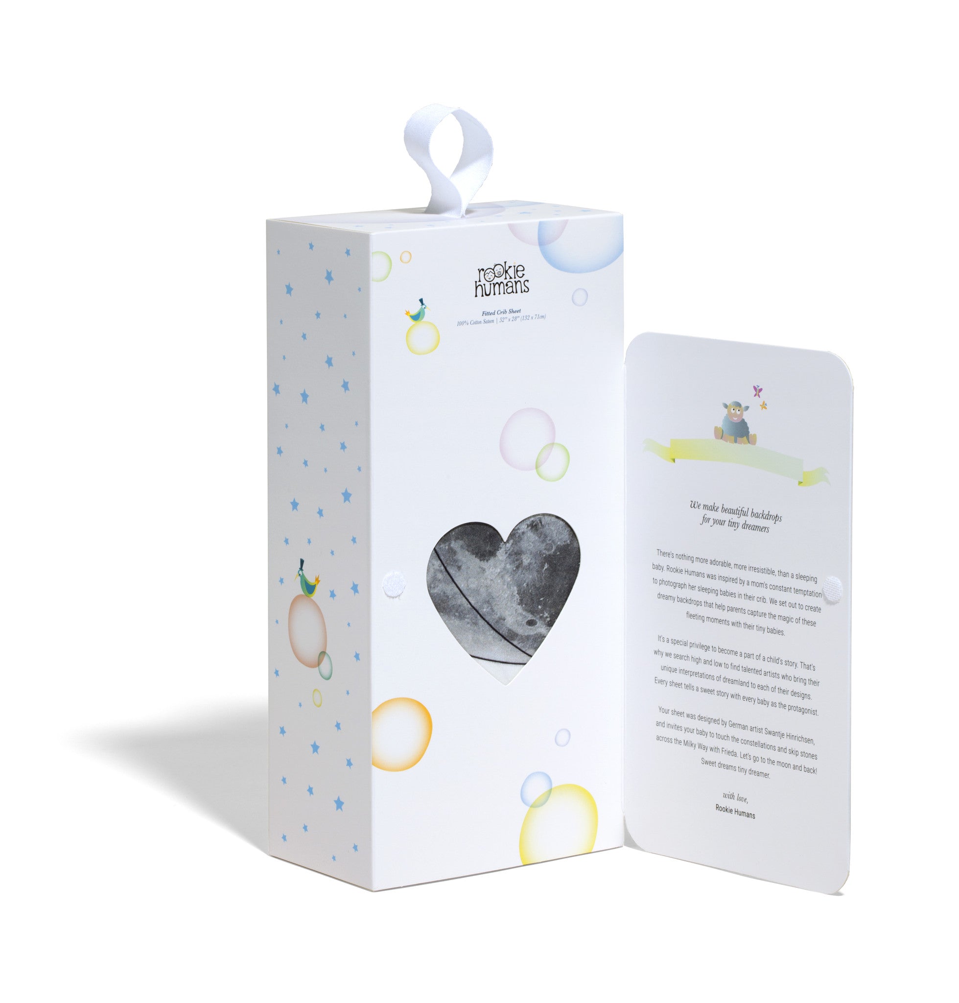 Fitted baby crib sheet by Rookie Humans, Frieda and the hot air balloon. Illustrated by Swanjte Hinrichsen. Designed for the modern nursery, packaged to make a unique baby shower gift. Monochrome nursery.