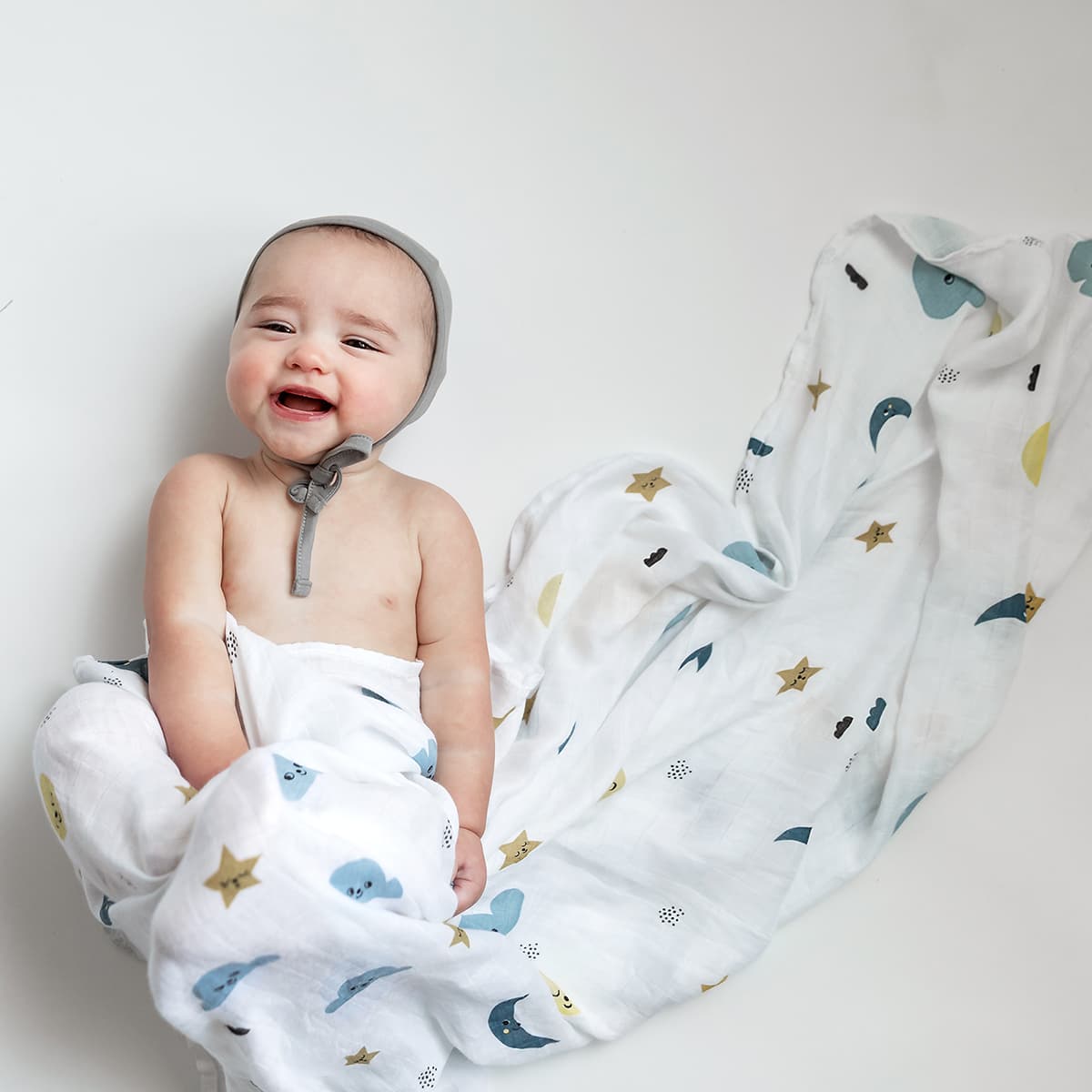 softest baby swaddle, bamboo swaddle moon stars and clouds by Rookie Humans